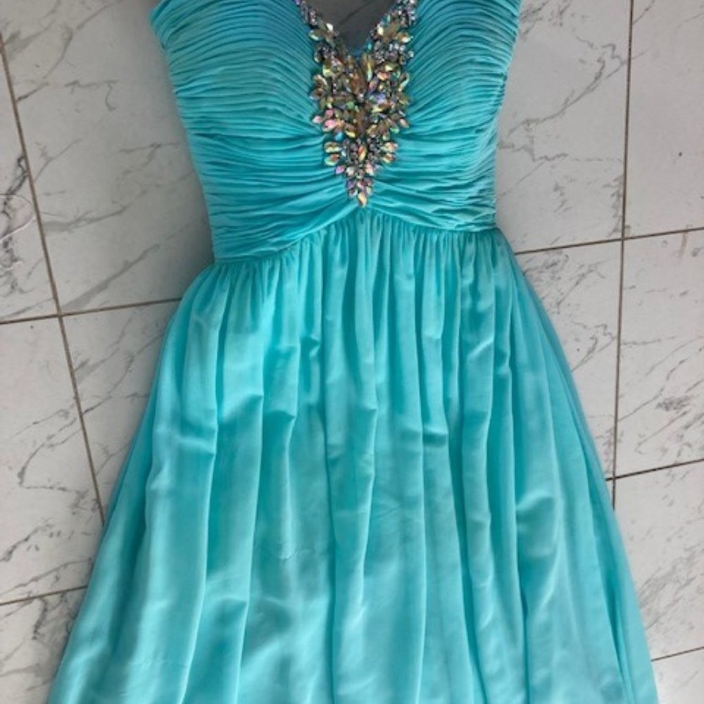 Floor-length strapless turquoise gown